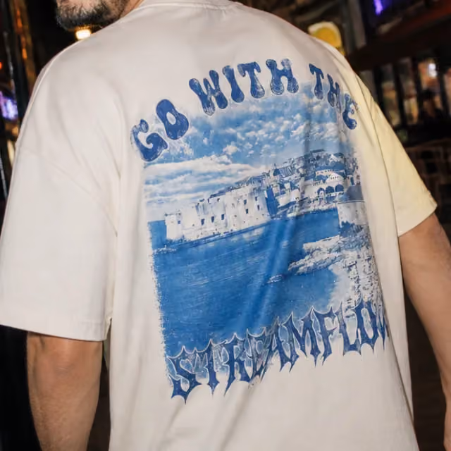Cream tee with a large photographic back print
